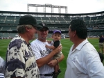 dan-elijah-and-mark-with-rockie-pitcher-raphael-betancourt-and-coors-field-in-denver